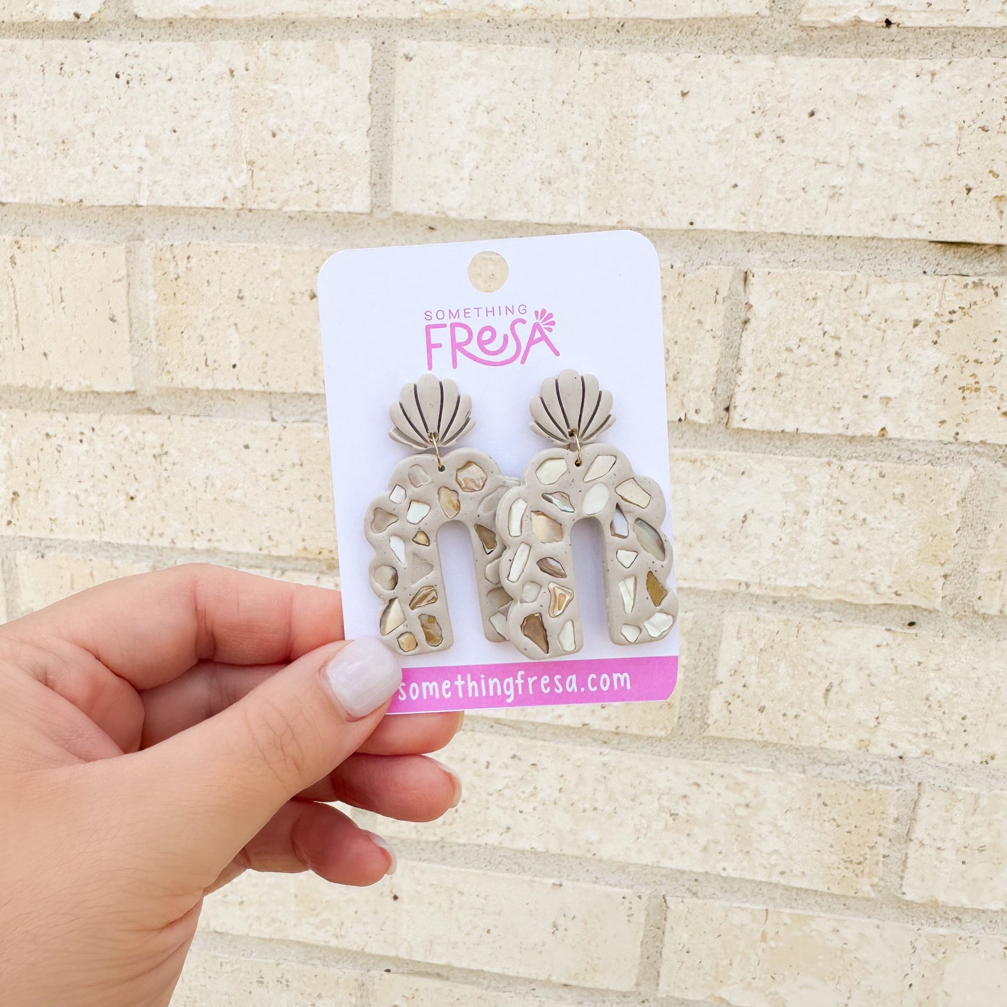 Sand and Conchitas de Mar Arch