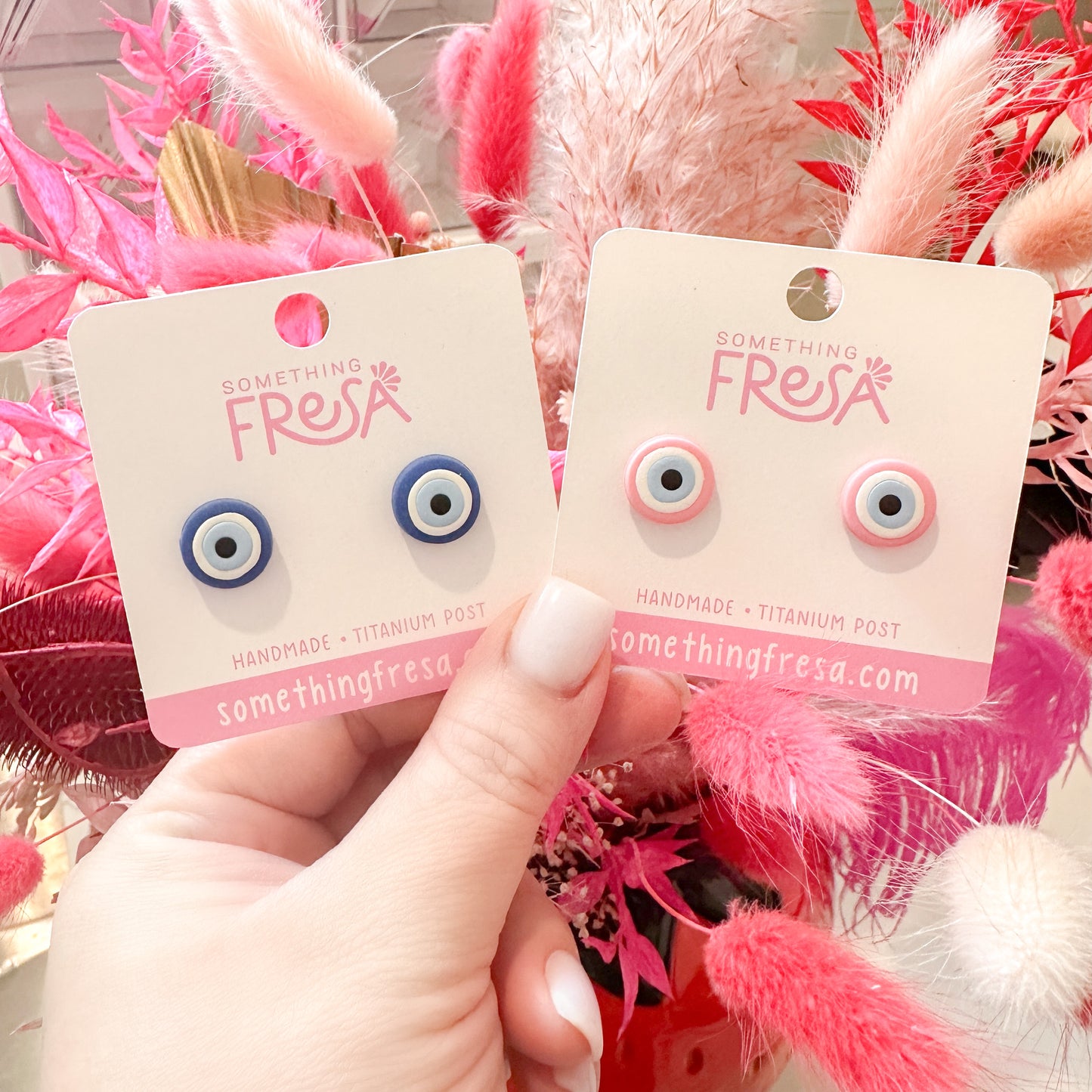 Pink Eye Studs